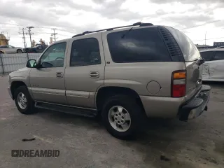 2001 Chevrolet Tahoe LS z VIN 1GNEC13T81R152119, wystawiony jako Copart lot #51171165 z przebiegiem 191 740 mil mil oraz Czysty tytuł • Clean title. Historia ofert i sprzedaży dostępna na DreamBid. Obrazek 2.