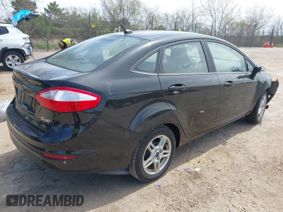 2018 Ford Fiesta SE with VIN 3FADP4BJ8JM103973, listed as a IAAI auction lot 42163251 with 145,205 mi miles and . Bid and sale history available at DreamBid. Image 4.