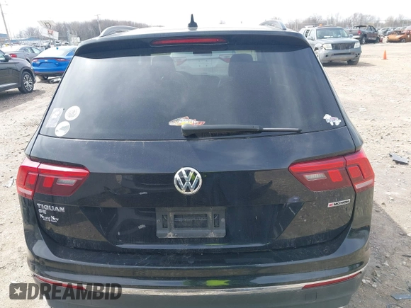 2021 Volkswagen Tiguan SE with VIN 3VV2B7AX4MM050282, listed as a IAAI auction lot 42124808 with 80,082 mi miles and . Bid and sale history available at DreamBid. Image 17.