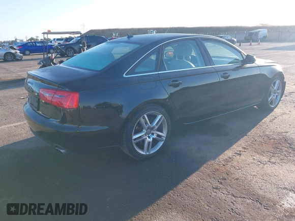 2014 Audi A6 Premium Plus with VIN WAUGFAFC7EN014764, listed as a IAAI auction lot 42261384 with 117,285 mi miles and . Bid and sale history available at DreamBid. Image 4.