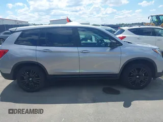 2021 Honda Passport Sport with VIN 5FNYF7H27MB003467, listed as a IAAI auction lot 42183219 with 52,156 mi miles and . Bid and sale history available at DreamBid. Image 13.