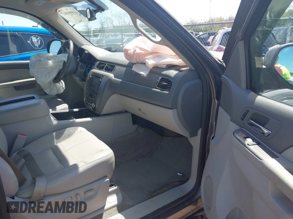 2013 Chevrolet Tahoe LT with VIN 1GNSKBE09DR325729, listed as a IAAI auction lot 41989587 with 186,361 mi miles and . Bid and sale history available at DreamBid. Image 5.