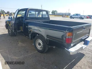 1989 Toyota Pickup DX z VIN JT4RN81P0K0029116, wystawiony jako IAAI lot #42474777 z przebiegiem 234 987 mil mil oraz . Historia ofert i sprzedaży dostępna na DreamBid. Obrazek 3.