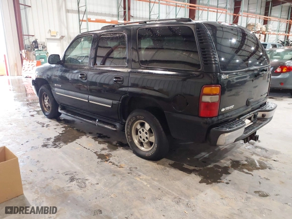 2003 Chevrolet Tahoe LT with VIN 1GNEC13Z43J340111, listed as a IAAI auction lot 41574135 with 251,307 mi miles. Bid and sale history available at carsss.com. Image 3.