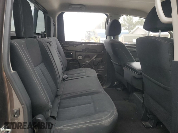 2017 Nissan Titan SV z VIN 1N6AA1EJ2HN538803, wystawiony jako Copart lot #48893625 z przebiegiem 166 415 mil mil oraz Szkoda całkowita • Salvage title. Historia ofert i sprzedaży dostępna na DreamBid. Obrazek 10.