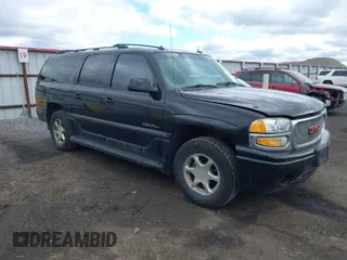 2003 GMC Yukon XL Denali with VIN 1GKFK66U33J337041, listed as a IAAI auction lot 41993603 with 239,904 mi miles. Bid and sale history available at carsss.com. Image 1.