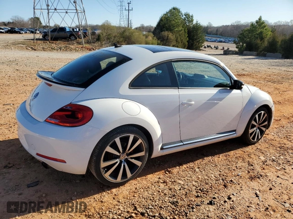 2012 Volkswagen Beetle 2.0T Turbo w/Sun/Snd/Nav PZEV with VIN 3VWVA7AT9CM656846, listed as a Copart auction lot 49466825 with 76,362 mi miles and Salvage Title. Bid and sale history available at carsss.com. Image 3.