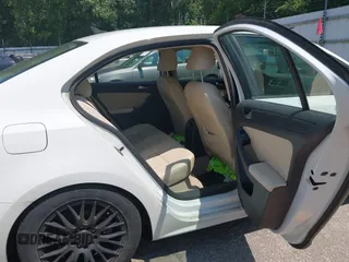 2014 Volkswagen Jetta SE with VIN 3VWD07AJ8EM296243, listed as a IAAI auction lot 42754554 with 149,717 mi miles and . Bid and sale history available at DreamBid. Image 8.