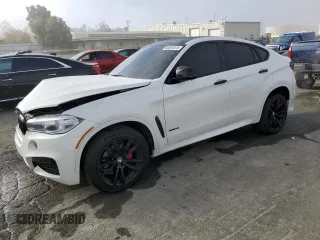 2015 BMW X6 sDrive35i with VIN 5UXKU0C58F0F92066, listed as a Copart auction lot 80597874 with 117,476 mi miles and Salvage Title. Bid and sale history available at carsss.com. Image 1.