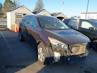 2016 Kia Sorento LX z VIN 5XYPGDA52GG046316, wystawiony jako IAAI lot #41898690 z przebiegiem 168 785 mil mil oraz . Historia ofert i sprzedaży dostępna na DreamBid. Obrazek 1.