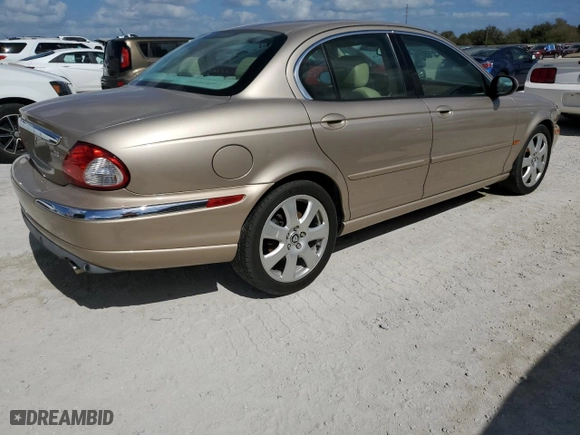 2004 Jaguar X-Type with VIN SAJEA51C34WE03194, listed as a Copart auction lot 78980144 with 51,164 mi miles and Clean Title. Bid and sale history available at carsss.com. Image 3.