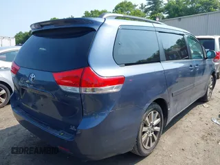 2013 Toyota Sienna LE with VIN 5TDJK3DC6DS070951, listed as a IAAI auction lot 42468510 with 235,537 mi miles and . Bid and sale history available at DreamBid. Image 4.