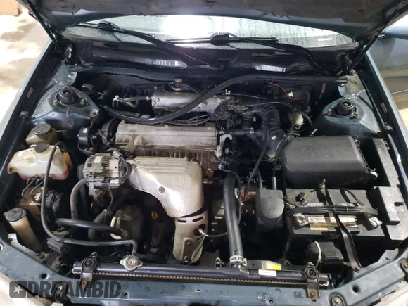 2000 Toyota Camry CE z VIN 4T1BG22K7YU744080, wystawiony jako Copart lot #56675105 z przebiegiem 226 154 mil mil oraz Szkoda całkowita • Salvage title. Historia ofert i sprzedaży dostępna na DreamBid. Obrazek 11.