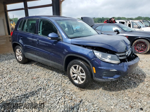2013 Volkswagen Tiguan S with VIN WVGAV3AX6DW621714, listed as a Copart auction lot 54730565 with 121,257 mi miles and Salvage title. Bid and sale history available at DreamBid. Image 4.
