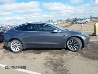 2018 Tesla Model 3 Long Range Battery with VIN 5YJ3E1EA4JF006036, listed as a IAAI auction lot 41934680 with 115,649 mi miles and . Bid and sale history available at DreamBid. Image 12.
