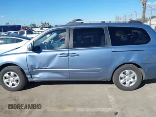 2008 Kia Sedona LX with VIN KNDMB233986218153, listed as a IAAI auction lot 41671096 with 144,933 mi miles. Bid and sale history available at carsss.com. Image 14.