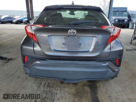 2019 Toyota C-HR XLE z VIN JTNKHMBX9K1026091, wystawiony jako Copart lot #50811835 z przebiegiem 86 424 mil mil oraz Szkoda całkowita • Salvage title. Historia ofert i sprzedaży dostępna na DreamBid. Obrazek 6.