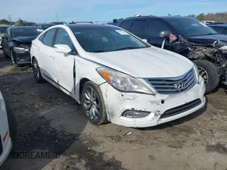2013 Hyundai Azera with VIN KMHFH4JGXDA225642, listed as a IAAI auction lot 41240583 with 173,157 mi miles and . Bid and sale history available at DreamBid. Image 1.