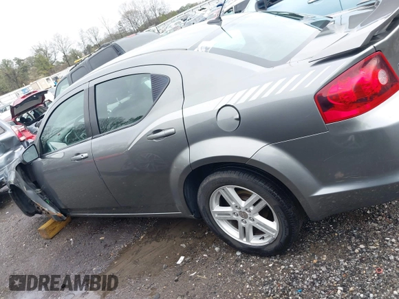 2013 Dodge Avenger SXT with VIN 1C3CDZCB5DN621881, listed as a IAAI auction lot 41739476 with 245,816 mi miles and . Bid and sale history available at DreamBid. Image 14.