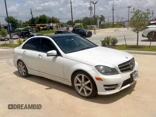 2014 Mercedes-Benz C 250 Sport with VIN WDDGF4HB4EA960827, listed as a Copart auction lot 65415035 with 140,661 mi miles and Clean title. Bid and sale history available at DreamBid. Image 1.