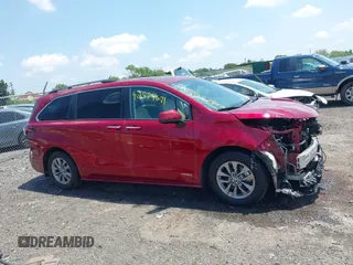 2021 Toyota Sienna XLE with VIN 5TDYSKFC5MS018541, listed as a IAAI auction lot 42579671 with 86,949 mi miles and . Bid and sale history available at DreamBid. Image 14.