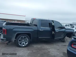 2018 GMC Sierra 1500 Denali with VIN 3GTU2PEJ8JG571593, listed as a IAAI auction lot 41169420 with 98,501 mi miles. Bid and sale history available at carsss.com. Image 13.