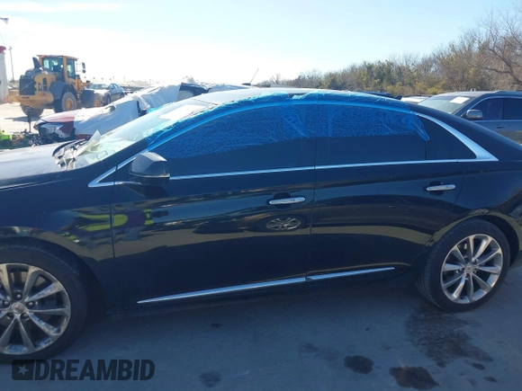 2013 Cadillac XTS Luxury with VIN 2G61P5S31D9116567, listed as a IAAI auction lot 41668056 with 196,744 mi miles. Bid and sale history available at carsss.com. Image 14.