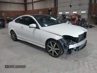 2015 Mercedes-Benz C 250 with VIN WDDGJ4HB5FG375879, listed as a IAAI auction lot 42454524 with 50,588 mi miles and . Bid and sale history available at DreamBid. Image 1.