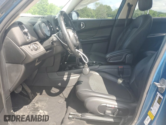 2018 MINI Countryman Cooper with VIN WMZYS7C36J3E08906, listed as a Copart auction lot 56538115 with 129,473 mi miles and Salvage title. Bid and sale history available at DreamBid. Image 7.