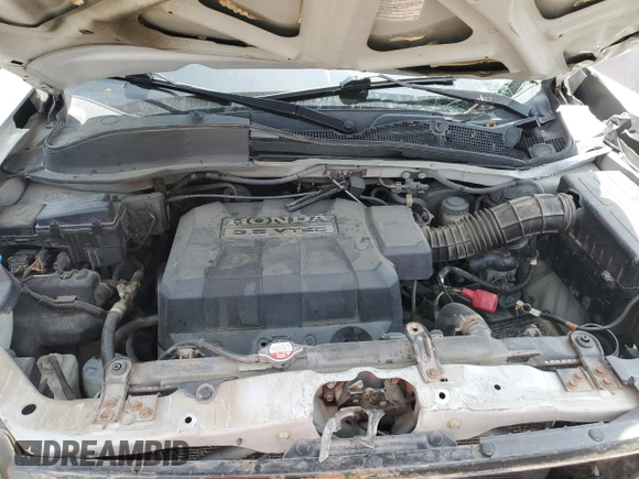 2007 Honda Ridgeline RTL with VIN 2HJYK16547H533699, listed as a Copart auction lot 61100115 with 241,366 mi miles and Salvage title. Bid and sale history available at DreamBid. Image 12.