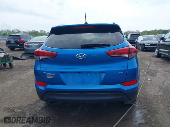 2016 Hyundai Tucson SE z VIN KM8J3CA46GU158341, wystawiony jako IAAI lot #42211047 z przebiegiem 84 112 mil mil oraz . Historia ofert i sprzedaży dostępna na DreamBid. Obrazek 17.
