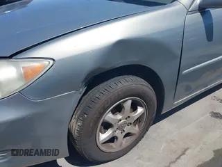 2006 Toyota Camry STD with VIN 4T1BE32K06U675483, listed as a IAAI auction lot 42001170 with 142,783 mi miles. Bid and sale history available at carsss.com. Image 6.