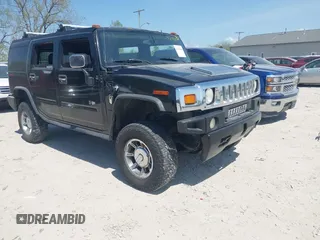 2005 Hummer H2 SUV with VIN 5GRGN23U25H128791, listed as a IAAI auction lot 42115436 with 286,818 mi miles. Bid and sale history available at carsss.com. Image 1.