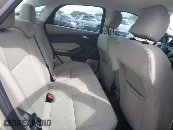 2017 Ford Focus SE z VIN 1FADP3F2XHL335127, wystawiony jako Copart lot #56119005 z przebiegiem 58 272 mil mil oraz Szkoda całkowita • Salvage title. Historia ofert i sprzedaży dostępna na DreamBid. Obrazek 10.