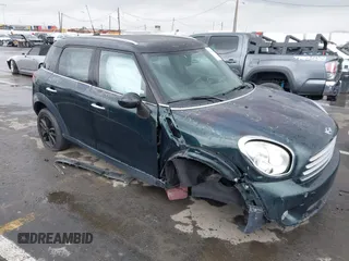 2012 MINI Countryman with VIN WMWZB3C56CWM02145, listed as a IAAI auction lot 41807065 with 153,619 mi miles and . Bid and sale history available at DreamBid. Image 1.