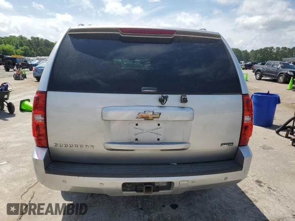 2011 Chevrolet Suburban LT с VIN 1GNSCJE00BR213311, выставлен на аукционе Copart как лот 55612835 с пробегом 219 379 миль миль и Списание • Salvage title. История ставок и продаж доступна на DreamBid. Изображение 6.