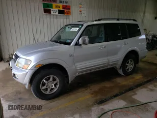 2001 Mitsubishi Montero Limited z VIN JA4MW51R11J040670, wystawiony jako Copart lot #76031264 z przebiegiem 212 740 mil mil oraz Szkody całkowita. Historia ofert i sprzedaży dostępna na DreamBid. Obrazek 1.