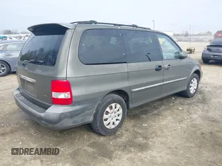 2004 Kia Sedona LX with VIN KNDUP131546543841, listed as a IAAI auction lot 41541012 with 112,122 mi miles. Bid and sale history available at carsss.com. Image 4.