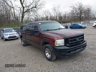 2004 Ford Super Duty F-250 XL with VIN 1FTNW20L34EA70689, listed as a IAAI auction lot 41923744 with 437,297 mi miles. Bid and sale history available at carsss.com. Image 1.