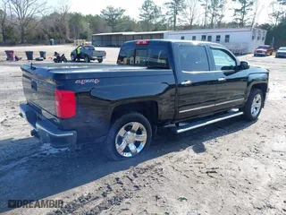 2015 Chevrolet Silverado 1500 LTZ with VIN 3GCUKSEC2FG311931, listed as a IAAI auction lot 41530887 with 103,280 mi miles. Bid and sale history available at carsss.com. Image 4.