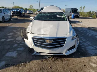 2015 Cadillac CTS RWD with VIN 1G6AP5SXXF0136820, listed as a Copart auction lot 54666385 with 129,763 mi miles and Clean title. Bid and sale history available at DreamBid. Image 5.