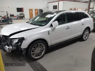 2013 Lincoln MKT EcoBoost with VIN 2LMHJ5AT3DBL56954, listed as a IAAI auction lot 41705877 with 148,771 mi miles. Bid and sale history available at carsss.com. Image 17.