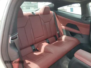 2023 BMW 4 Series 430i z VIN WBA53AP08PCL86794, wystawiony jako Copart lot #71081484 z przebiegiem 31 673 mil mil oraz Szkoda całkowita • Salvage title. Historia ofert i sprzedaży dostępna na DreamBid. Obrazek 10.