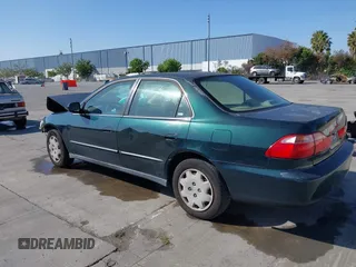 1999 Honda Accord LX with VIN JHMCG6659XC019748, listed as a IAAI auction lot 42141554 with 331,904 mi miles and . Bid and sale history available at DreamBid. Image 3.