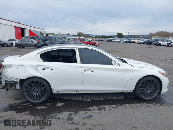 2014 Infiniti Q50 Premium z VIN JN1BV7AP8EM671403, wystawiony jako IAAI lot #41837716 z przebiegiem 115 058 mil mil oraz . Historia ofert i sprzedaży dostępna na DreamBid. Obrazek 14.