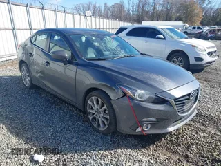 2015 Mazda 3 S Grand Touring z VIN JM1BM1W35F1220774, wystawiony jako IAAI lot #41422484 z przebiegiem 129 891 mil mil oraz . Historia ofert i sprzedaży dostępna na DreamBid. Obrazek 1.