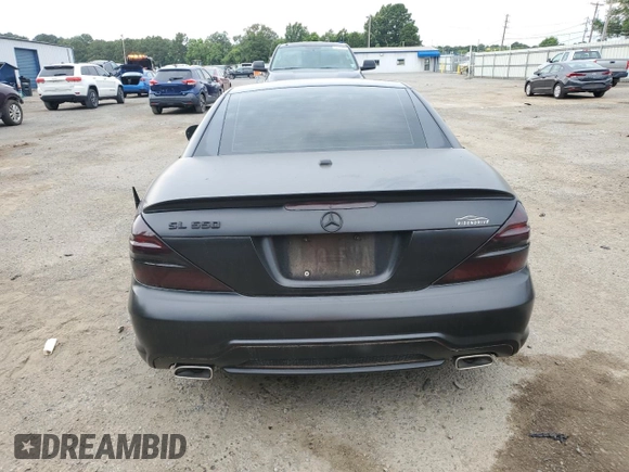 2009 Mercedes-Benz SL 550 с VIN WDBSK71F39F155827, выставлен на аукционе Copart как лот 59483095 с пробегом 74 017 миль миль и Списание • Salvage title. История ставок и продаж доступна на DreamBid. Изображение 6.