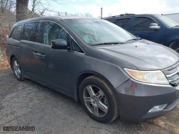 2012 Honda Odyssey Touring with VIN 5FNRL5H97CB025336, listed as a IAAI auction lot 41715068 with NaN miles. Bid and sale history available at carsss.com. Image 13.
