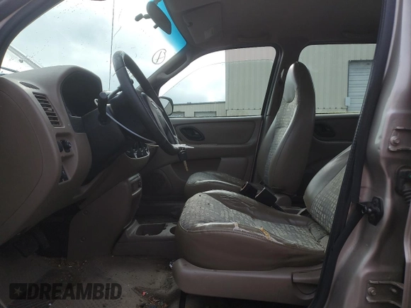 2001 Ford Escape XLS with VIN 1FMYU02111KA37010, listed as a Copart auction lot 52328415 with 312,425 mi miles and Salvage title. Bid and sale history available at DreamBid. Image 7.