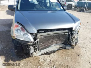 2006 Honda CR-V LX with VIN JHLRD68586C024863, listed as a IAAI auction lot 41569505 with 210,624 mi miles. Bid and sale history available at carsss.com. Image 6.